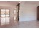 Open dining room with view of the pool and glass wine cellar at 32702 View Haven Ln, Sorrento, FL 32776