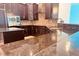 Granite countertop kitchen island with breakfast bar at 32702 View Haven Ln, Sorrento, FL 32776
