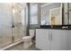 Bright bathroom with a walk-in shower, modern fixtures, and a sleek vanity for a clean design at 1758 Oak Blossom Dr, Davenport, FL 33837