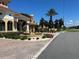 Community entrance with fountain and landscaping at 1844 Coriander Dr, Poinciana, FL 34759