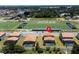 Aerial view of house with pool; close to community and school at 224 Macaulay'S Cv, Haines City, FL 33844