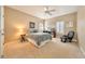 Cozy bedroom with neutral decor and ample natural light at 8625 Bay Hill Blvd, Orlando, FL 32819