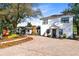 Brick driveway leads to two-story house with unique landscaping at 500 Freyer Dr, Longwood, FL 32750