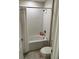 Clean bathroom with a bathtub and shower at 4499 Magnolia Ridge Ct, Kissimmee, FL 34746