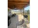 Covered patio with outdoor dining furniture and grill at 4499 Magnolia Ridge Ct, Kissimmee, FL 34746