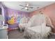 Themed bedroom featuring two custom carriage beds and princess wall art at 7713 Graben St, Kissimmee, FL 34747