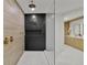 Bathroom with a frameless glass shower and dark tile at 6000 Tarawood Dr, Orlando, FL 32819