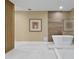 Bathroom with freestanding tub and marble flooring at 6000 Tarawood Dr, Orlando, FL 32819