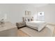 Cozy bedroom featuring light wood floors and neutral color scheme at 6000 Tarawood Dr, Orlando, FL 32819