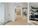 Elegant hallway showcasing a wine cellar and modern design at 6000 Tarawood Dr, Orlando, FL 32819