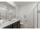 Accessible bathroom featuring safety bars, modern fixtures, and a glass shower at 1065 Splash Shot Pl # 1801, Davenport, FL 33896