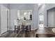 Kitchen breakfast bar with two off-white stools at 145 Lewis Dr, Davenport, FL 33837