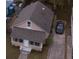 Aerial view of a tan house with a driveway at 806 Florida Ave, Saint Cloud, FL 34769