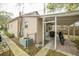 Rear view of a tan house with a carport at 806 Florida Ave, Saint Cloud, FL 34769