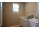 Laundry room with washer, dryer, and countertop space at 1676 Andover Ridge Dr, Deland, FL 32720