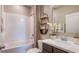 Simple bathroom with a bathtub and floating shelves at 1677 Andover Ridge Dr, Deland, FL 32720