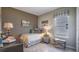 Charming bedroom with a single bed and baseball themed decor at 1677 Andover Ridge Dr, Deland, FL 32720
