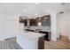 Modern kitchen with an island and light countertops at 1677 Andover Ridge Dr, Deland, FL 32720