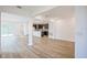 Bright and spacious living area with hardwood floors and an open floor plan at 1677 Andover Ridge Dr, Deland, FL 32720