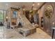 Unique stone fireplace feature in the living room with custom wood paneling at 208 Green Lake Cir, Longwood, FL 32779