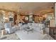 Spacious living room featuring a decorative fireplace, comfortable seating, and stylish decor at 208 Green Lake Cir, Longwood, FL 32779