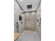 Spa-like shower with stone wall and multiple shower heads at 39250 Forest Dr, Eustis, FL 32736