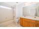 Bathroom with tiled flooring, double sink vanity and shower/tub combo at 608 Abaco Ct, Kissimmee, FL 34746