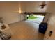 Spacious garage featuring tile floors with space for parking and storage at 608 Abaco Ct, Kissimmee, FL 34746