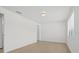 Bright bedroom with wood-look floors and ample natural light at 4945 Sanoma Vlg # B, Orlando, FL 32808