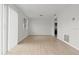 Bright, open living space with wood-style flooring, neutral walls and lots of light at 4945 Sanoma Vlg # B, Orlando, FL 32808