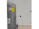 Close up of Rheem hot water heater and utility connections at 4945 Sanoma Vlg # B, Orlando, FL 32808