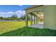 Covered patio and spacious backyard at 1929 Sipes Ave, Sanford, FL 32771
