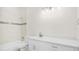Modern bathroom with white vanity and a bathtub shower combo at 1929 Sipes Ave, Sanford, FL 32771
