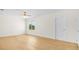 Bright bedroom featuring hardwood floors, a ceiling fan, and a window with a view at 1929 Sipes Ave, Sanford, FL 32771