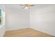 Bright bedroom with light wood floors and ceiling fan at 1929 Sipes Ave, Sanford, FL 32771