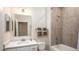 Clean bathroom with tub, shower, and single vanity at 204 Barrington Dr, Haines City, FL 33844