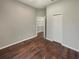 Bedroom with wood floors, neutral wall paint, and a closet at 148 Blue Stone Cir, Winter Garden, FL 34787