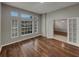 Comfortable living room with hardwood floors, and large windows at 148 Blue Stone Cir, Winter Garden, FL 34787