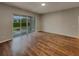 Bright living room with sliding glass doors to backyard at 148 Blue Stone Cir, Winter Garden, FL 34787