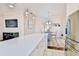 Modern kitchen with stainless steel appliances and white cabinetry at 7459 Excitement Dr, Reunion, FL 34747