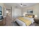 Stylishly furnished bedroom with a bed, nightstands, and decor enhancing the room's appeal at 5692 Camilla St, St Cloud, FL 34771