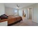 Comfortable bedroom featuring a ceiling fan, a window with natural light, and a full-size bed at 5692 Camilla St, St Cloud, FL 34771
