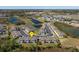 Aerial view of the community with lush green landscaping, ponds and convenient parking at 410 Annabelle Way, Davenport, FL 33837