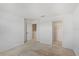 Carpeted main bedroom featuring neutral walls and a closet at 410 Annabelle Way, Davenport, FL 33837