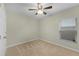 Neutral bedroom with fan, and window offering natural light at 687 Campo Ln, Davenport, FL 33837
