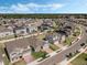 Overhead view of the neighborhood showcasing homes with well-kept lawns at 687 Campo Ln, Davenport, FL 33837