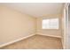 Bedroom with window and carpet flooring at 4791 S Texas Ave # 4791D, Orlando, FL 32839