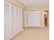 Bedroom with double closets and carpet at 4791 S Texas Ave # 4791D, Orlando, FL 32839