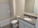 Bathroom with granite vanity, tub and tile floor at 2453 Shiprock Ct, Deltona, FL 32738