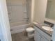 Bathroom with shower, granite vanity, and tile floor at 2453 Shiprock Ct, Deltona, FL 32738